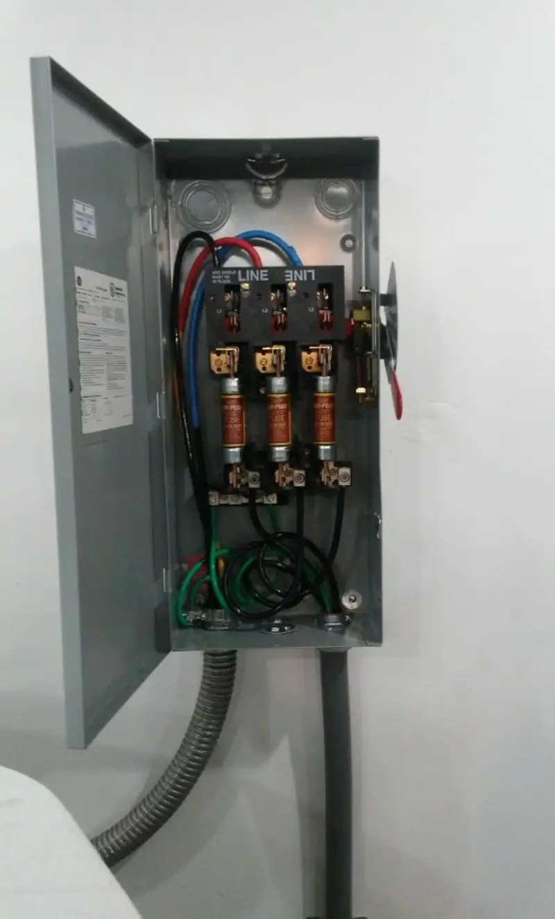Three-phase disconnect switch installed for Smoke Detector Installation in Dyersville